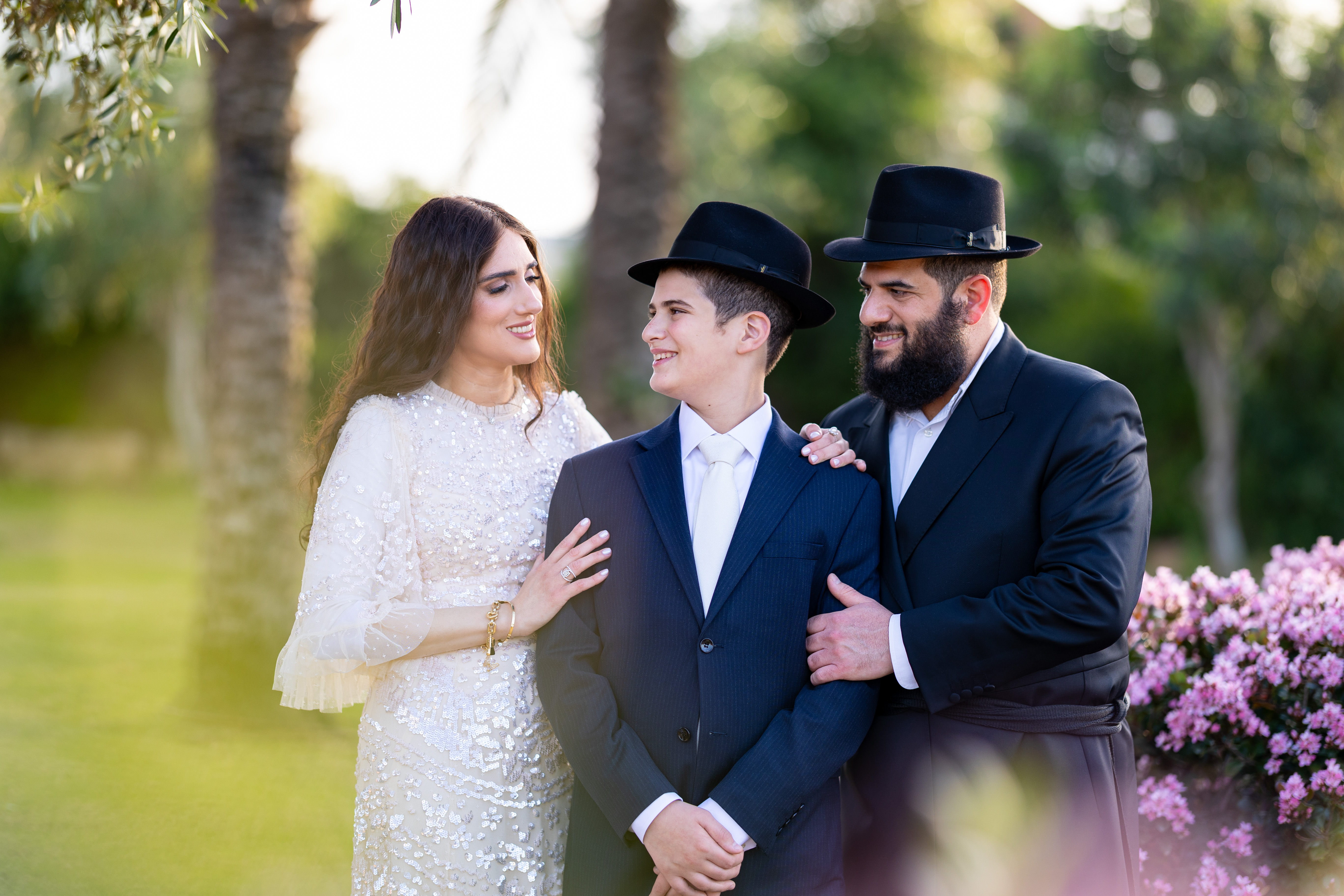 A Bar Mitzvah boy with his parents
